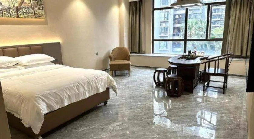 Bed in Vienna Hotel Xinfeng West High-Speed Railway Station