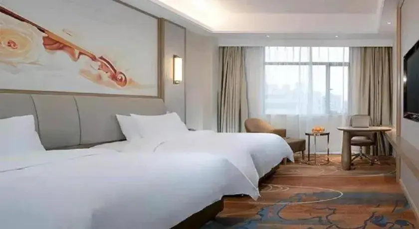 Bed in Vienna Hotel Xinfeng West High-Speed Railway Station Bed in Vienna Hotel Xinfeng West High-Speed Railway Station