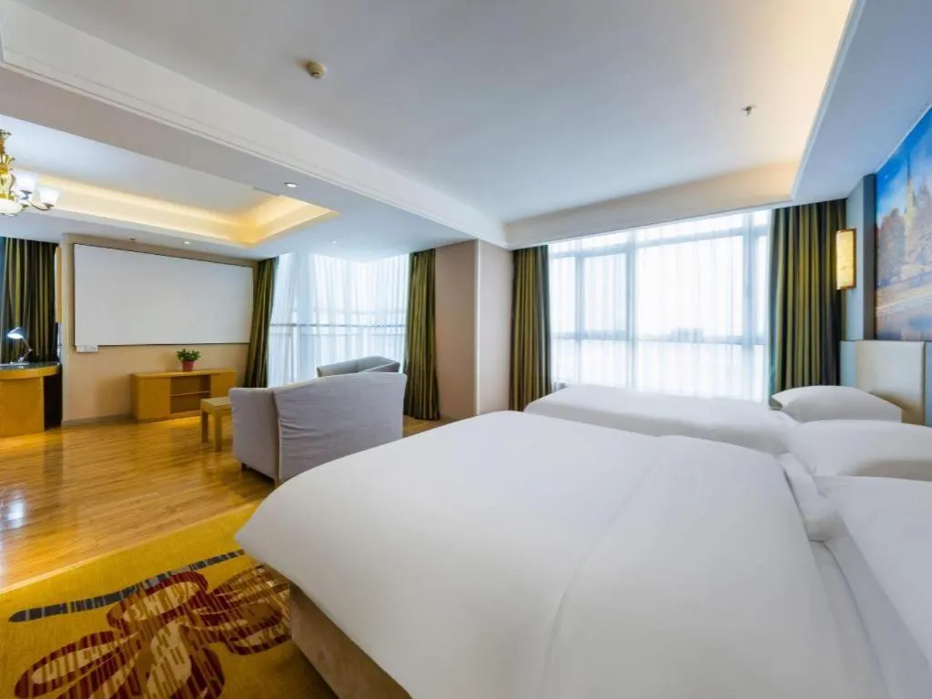 Bed in Vienna Hotel Shandong Qingzhou Ancient City