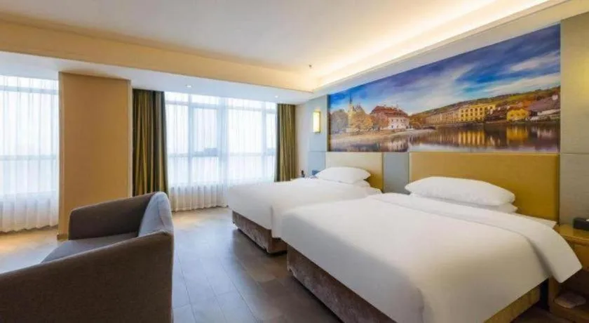 Bed in Vienna Hotel Shandong Qingzhou Ancient City