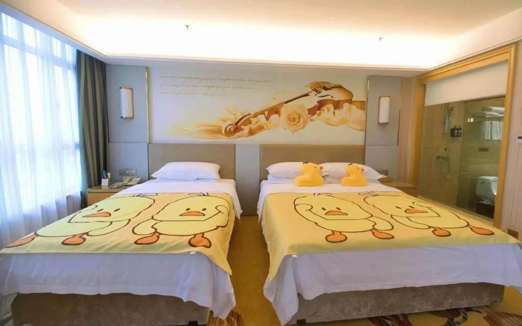Bed in Vienna Hotel Shandong Qingzhou Ancient City