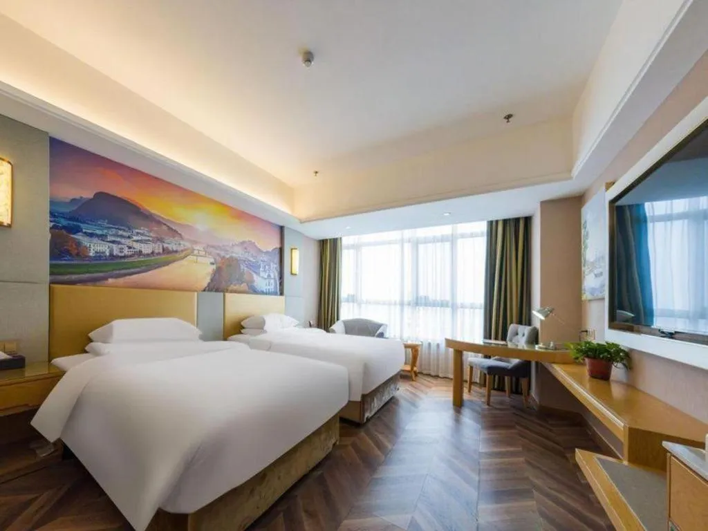 Bed in Vienna Hotel Shandong Qingzhou Ancient City