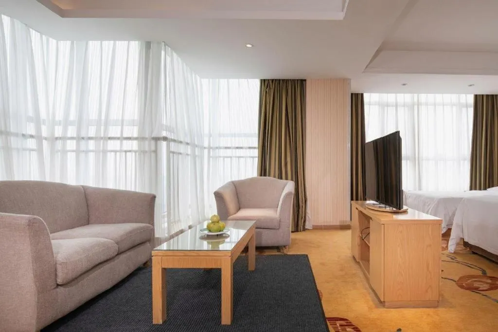 Bed in Vienna Hotel Shandong Qingzhou Ancient City