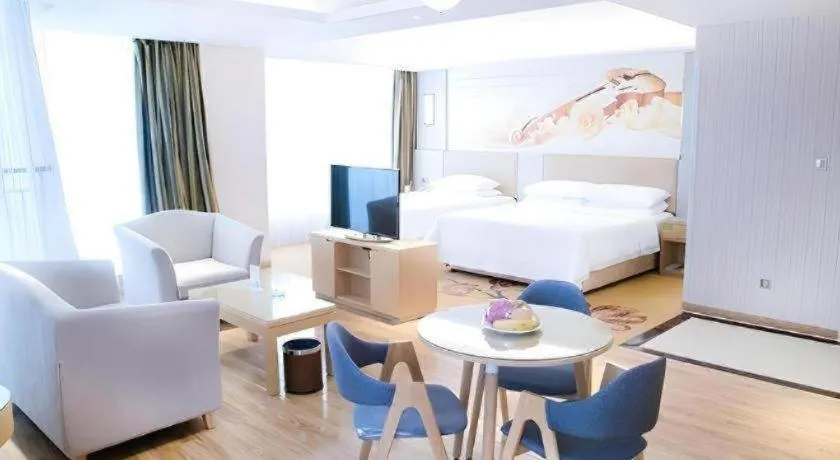 Bed in Vienna Hotel Shandong Qingzhou Ancient City