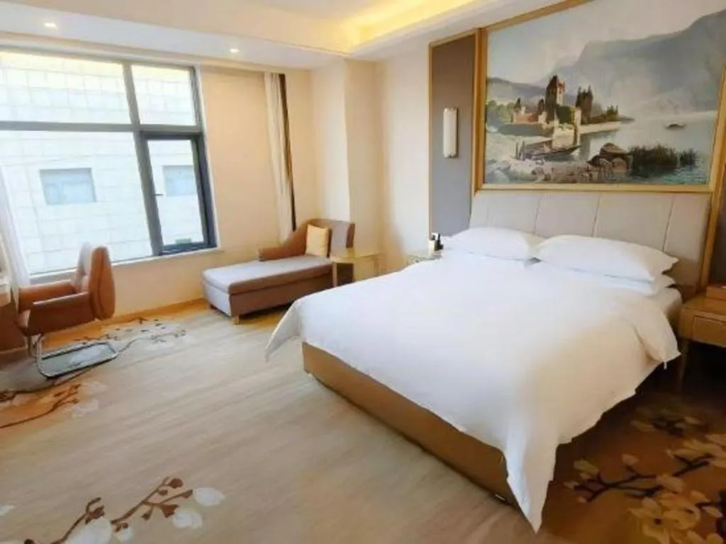 Bed in Vienna Hotel Tianjin Binhai International Airport Free Trade Zone