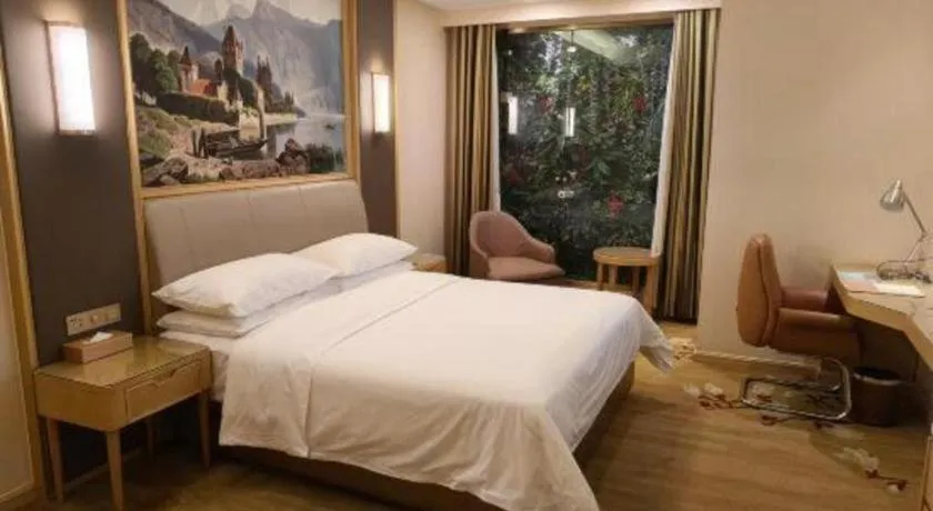 Bed in Vienna Hotel Tianjin Binhai International Airport Free Trade Zone