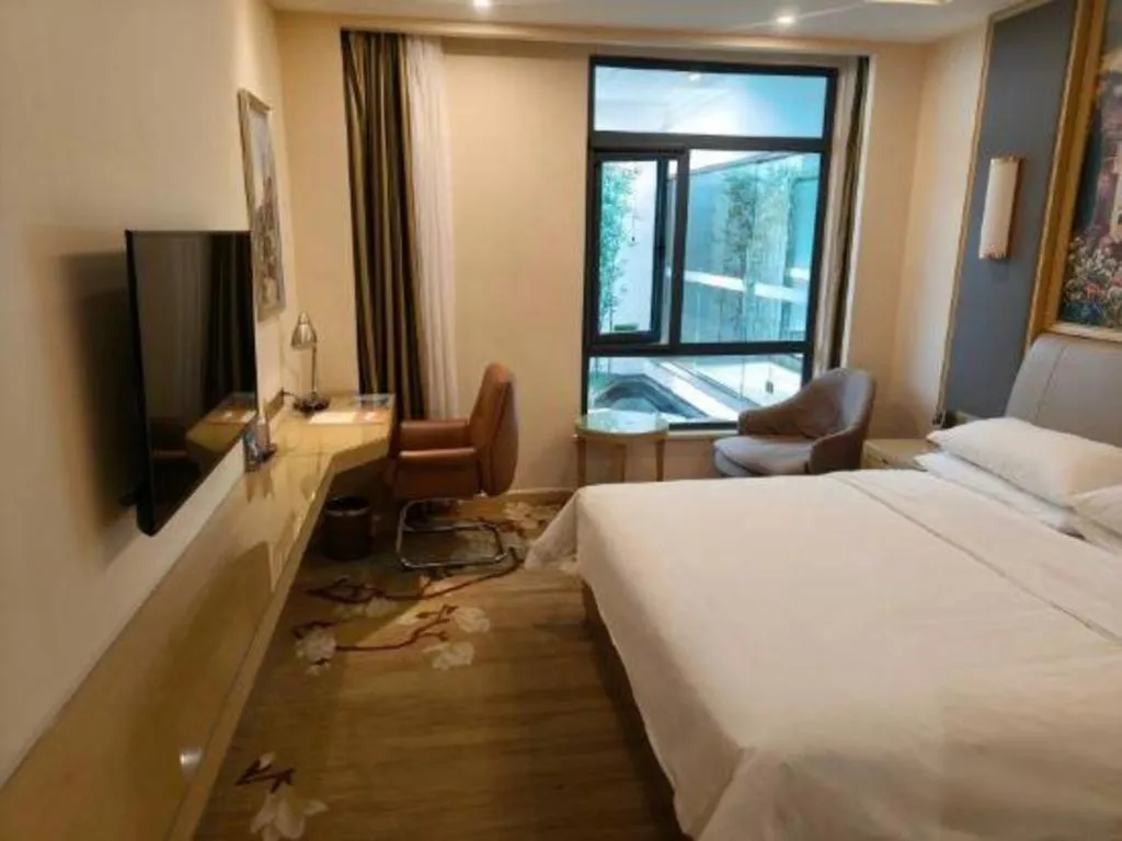 Bed in Vienna Hotel Tianjin Binhai International Airport Free Trade Zone