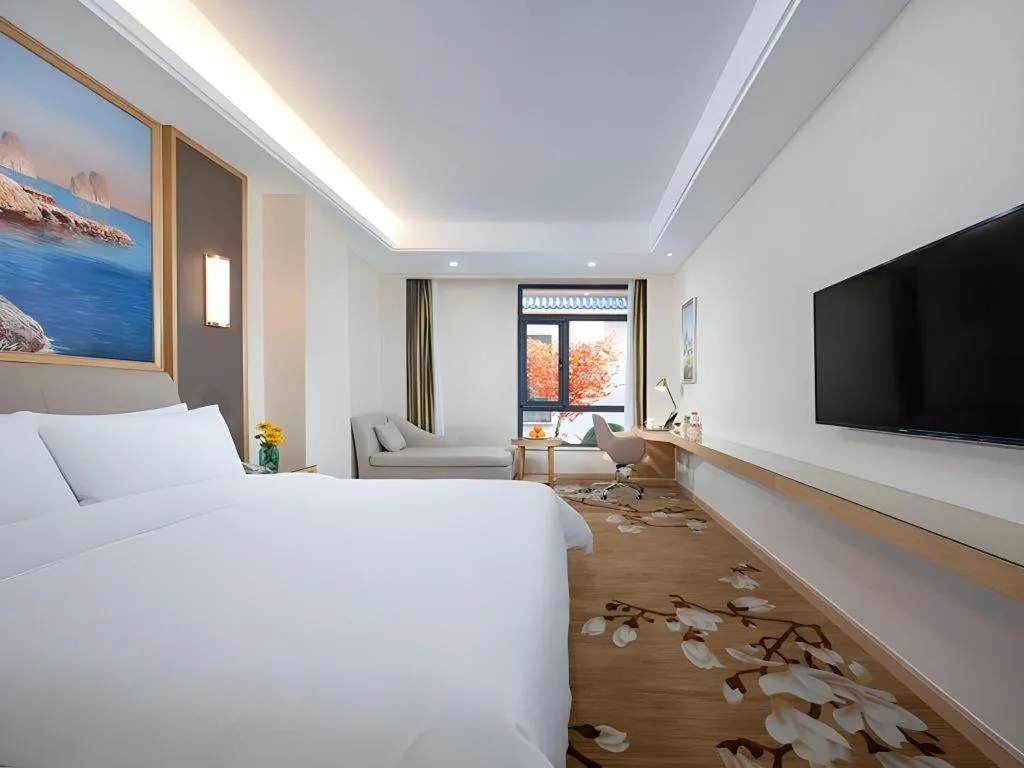 Bed in Vienna Hotel Tianjin Binhai International Airport Free Trade Zone