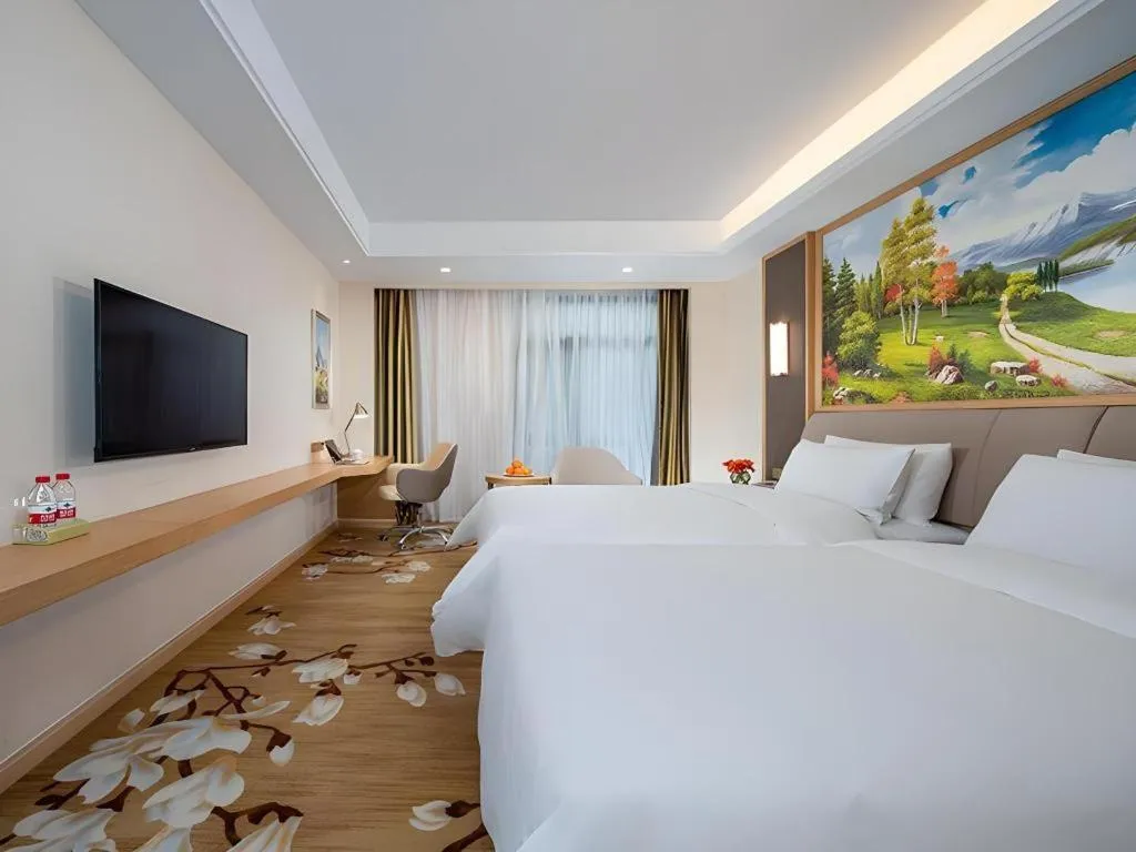 Bed in Vienna Hotel Tianjin Binhai International Airport Free Trade Zone