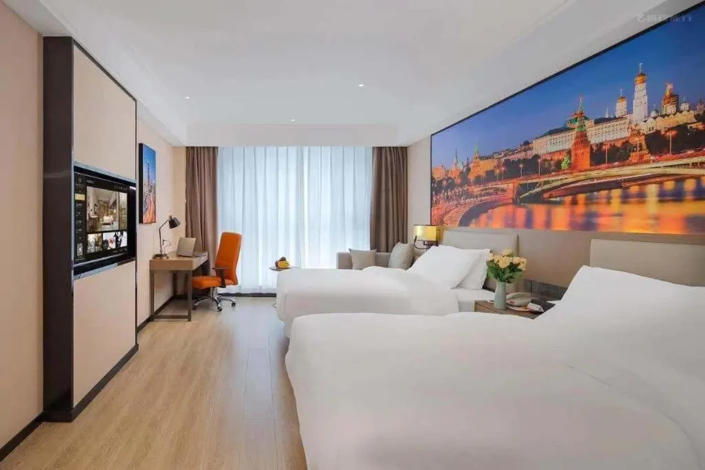 Bed in Vienna Hotel Tianjin Jinzhong Street