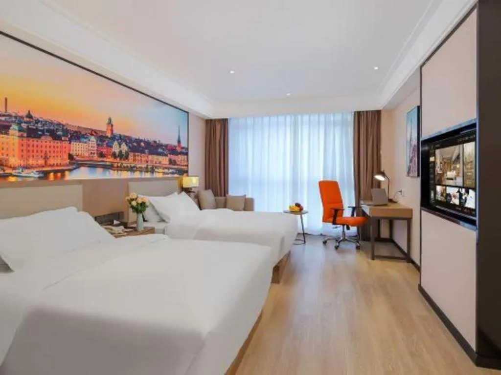 Bed in Vienna Hotel Tianjin Jinzhong Street