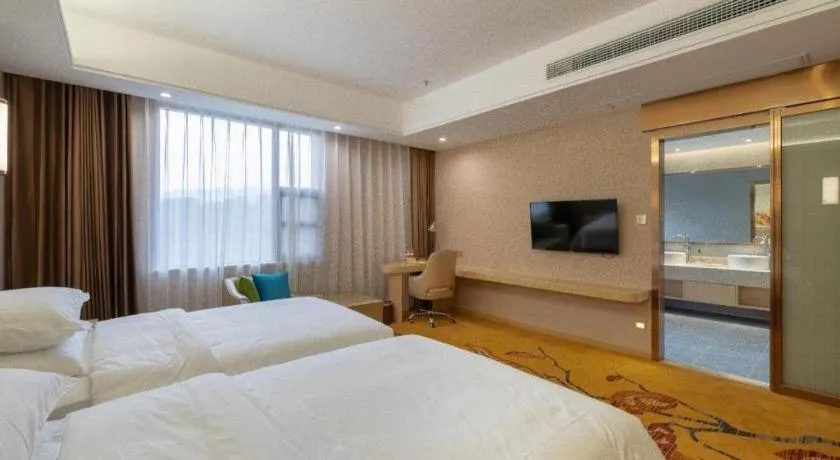 Bed in Vienna Hotel Nanchang Wanli