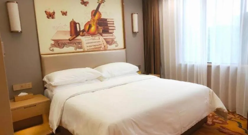Bed in Vienna Hotel Nanchang Wanli