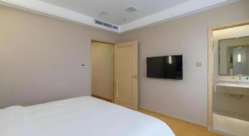 Bed in Vienna Hotel Nanchang Wanli