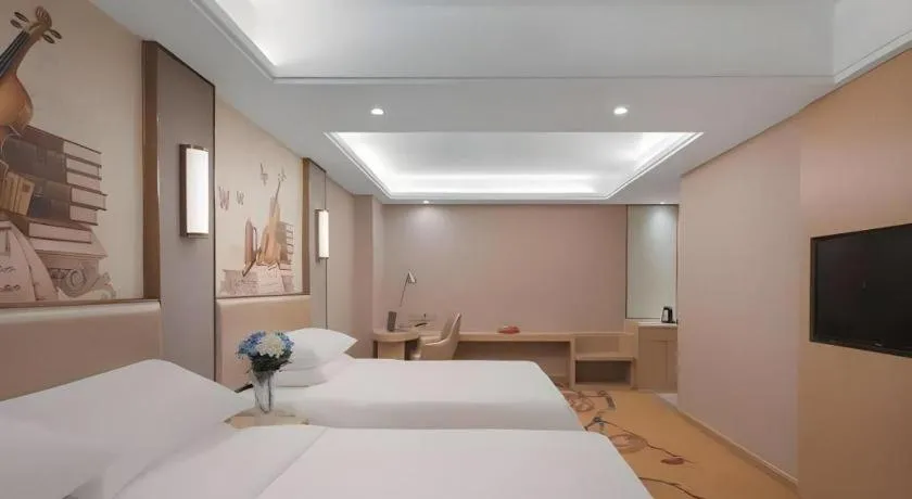 Bed in Vienna Hotel Nanchang Wanli