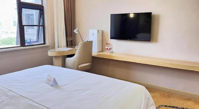 Bed in Vienna Hotel Nanchang Wanli