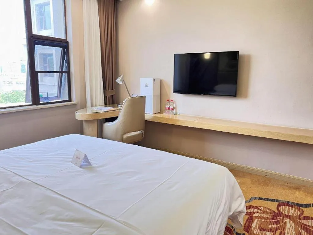 Bed in Vienna Hotel Nanchang Wanli