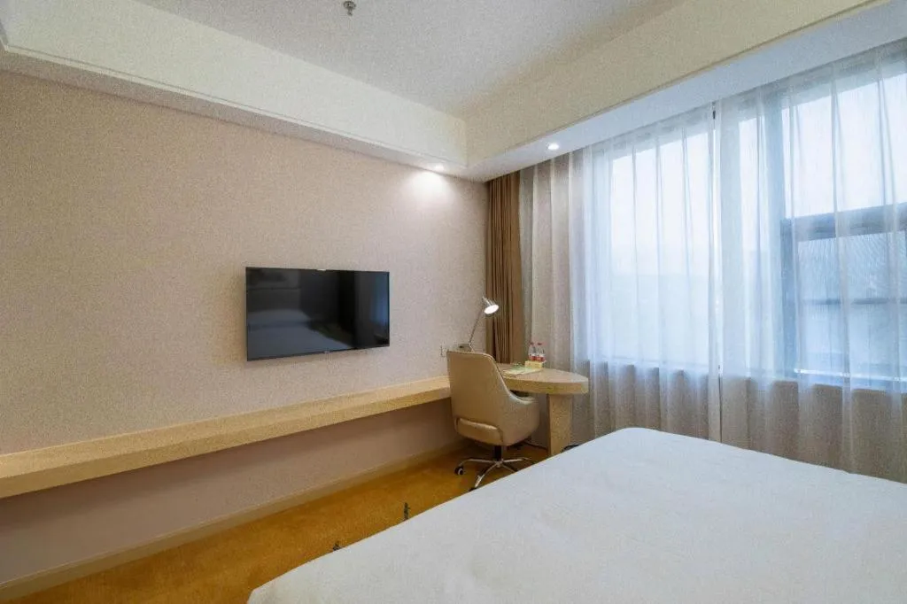 Bed in Vienna Hotel Nanchang Wanli