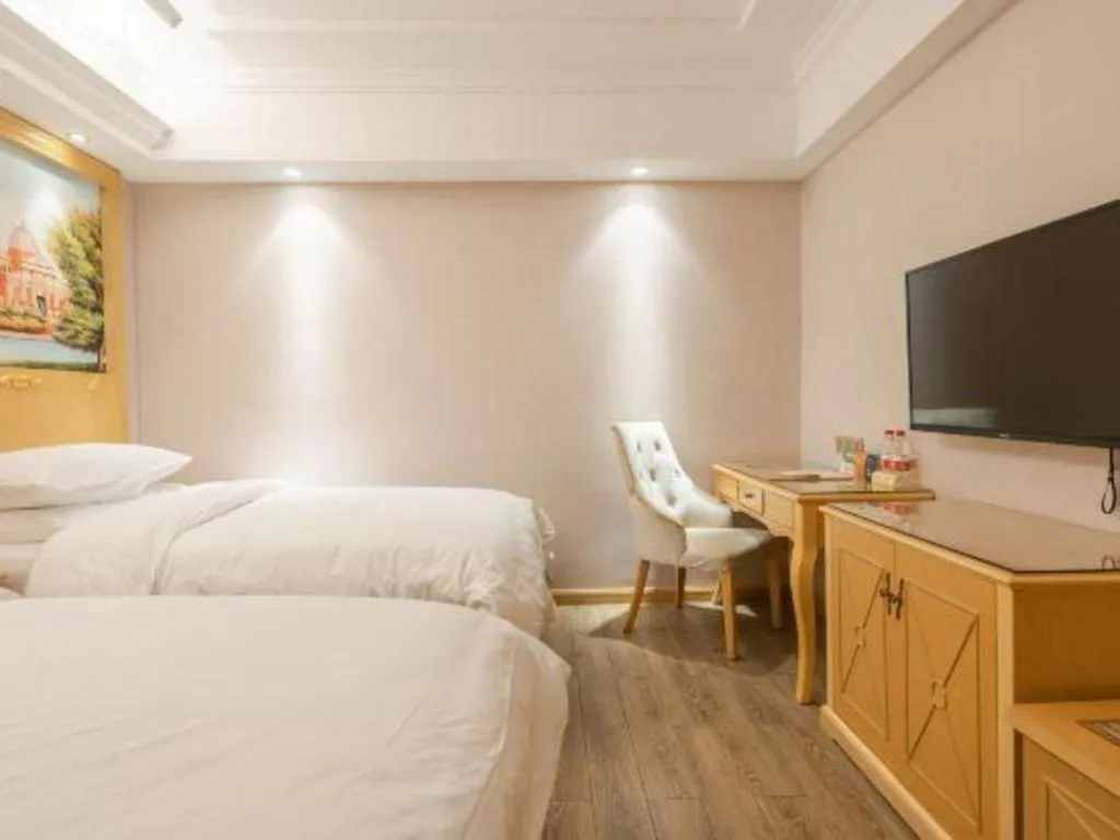 Bed in Vienna Hotel Hangzhou West Lake Qingchun Road