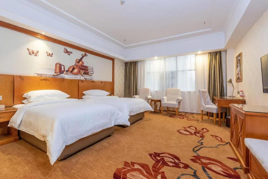 Bed in Vienna Hotel Hunan Shaoyang South Railway Station