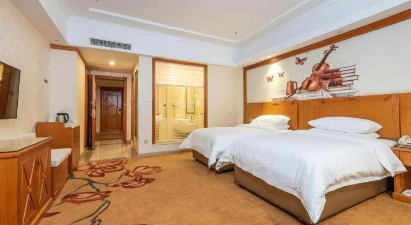 Bed in Vienna Hotel Hunan Shaoyang South Railway Station