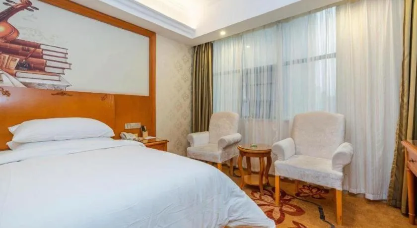 Bed in Vienna Hotel Hunan Shaoyang South Railway Station