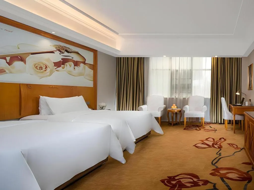 Bed in Vienna Hotel Hunan Shaoyang South Railway Station