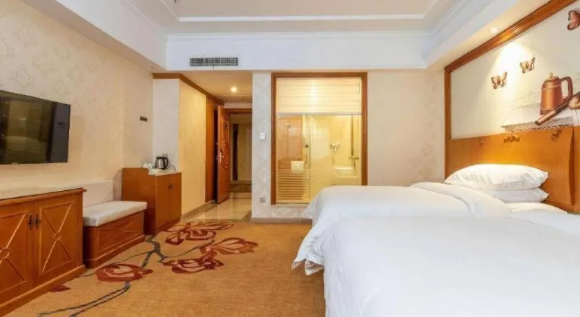 Bed in Vienna Hotel Hunan Shaoyang South Railway Station