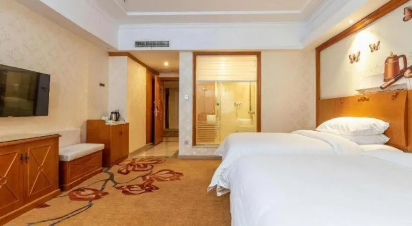 Bed in Vienna Hotel Hunan Shaoyang South Railway Station