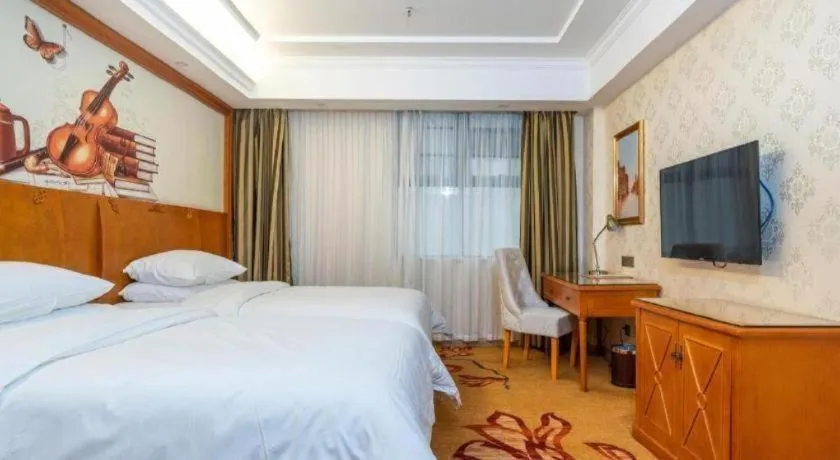 Bed in Vienna Hotel Hunan Shaoyang South Railway Station