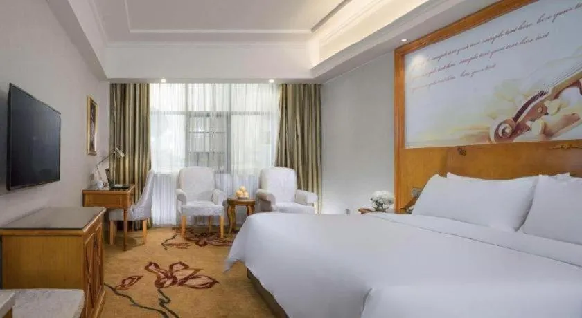 Bed in Vienna Hotel Hunan Shaoyang South Railway Station