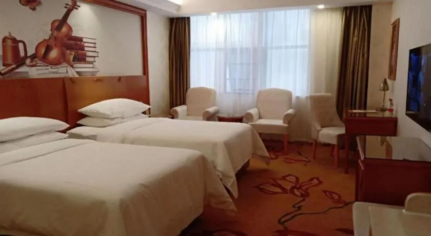 Bed in Vienna Hotel Hunan Shaoyang South Railway Station