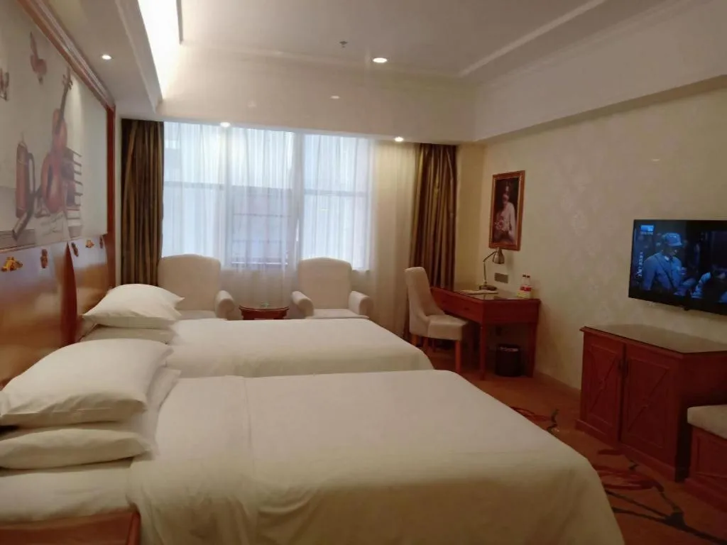 Bed in Vienna Hotel Hunan Shaoyang South Railway Station