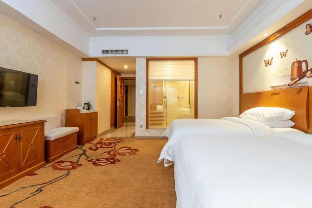 Bed in Vienna Hotel Hunan Shaoyang South Railway Station