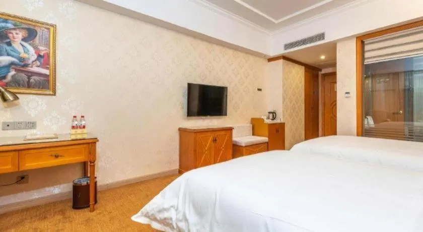 Bed in Vienna Hotel Hunan Shaoyang South Railway Station