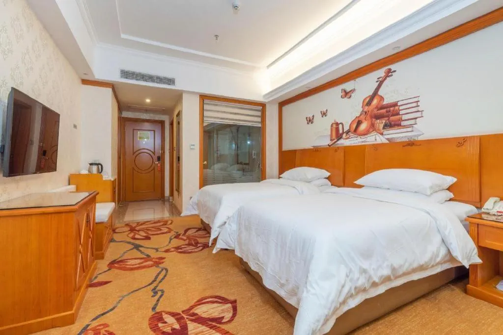 Bed in Vienna Hotel Hunan Shaoyang South Railway Station