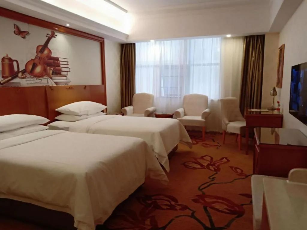 Bed in Vienna Hotel Hunan Shaoyang South Railway Station