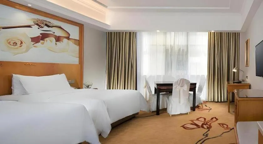 Bed in Vienna Hotel Hunan Shaoyang South Railway Station