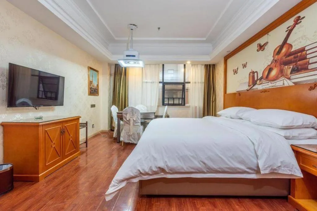 Bed in Vienna Hotel Hunan Shaoyang South Railway Station