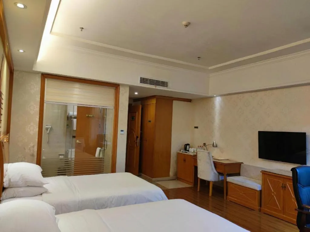 Bed in Vienna Hotel Hunan Shaoyang South Railway Station