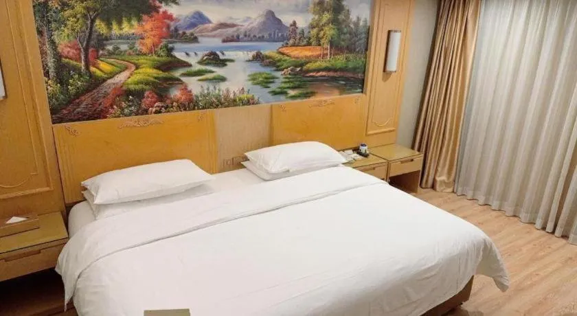 Bed in Vienna Hotel Chongqing Jiefangbei Hongyadong