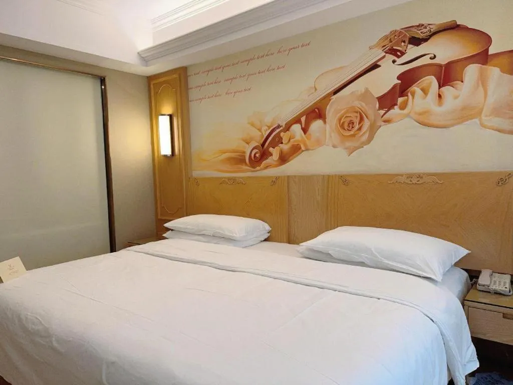 Bed in Vienna Hotel Chongqing Jiefangbei Hongyadong