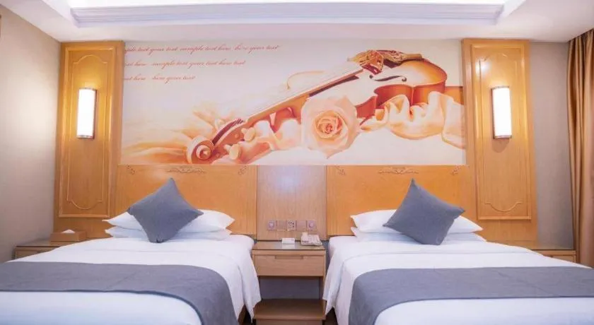 Bed in Vienna Hotel Chongqing Jiefangbei Hongyadong