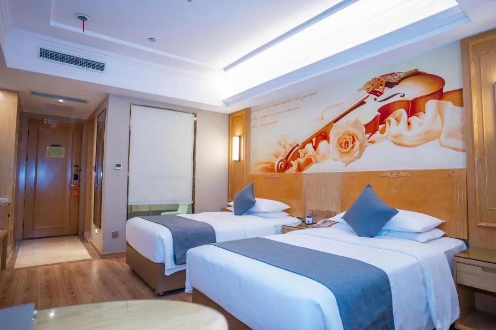 Bed in Vienna Hotel Chongqing Jiefangbei Hongyadong