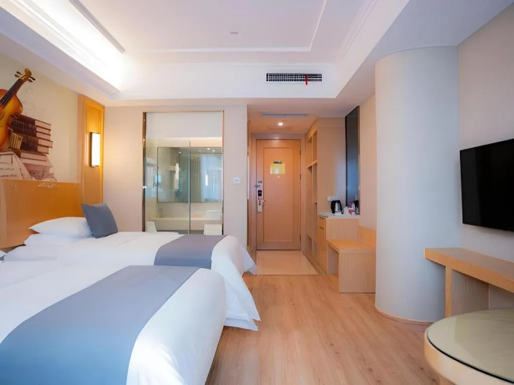 Bed in Vienna Hotel Chongqing Jiefangbei Hongyadong