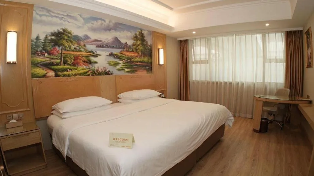 Bed in Vienna Hotel Chongqing Jiefangbei Hongyadong