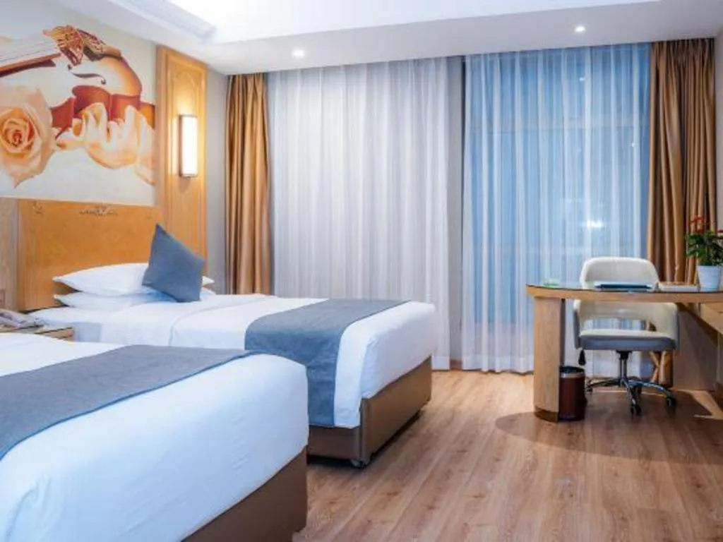 Bed in Vienna Hotel Chongqing Jiefangbei Hongyadong