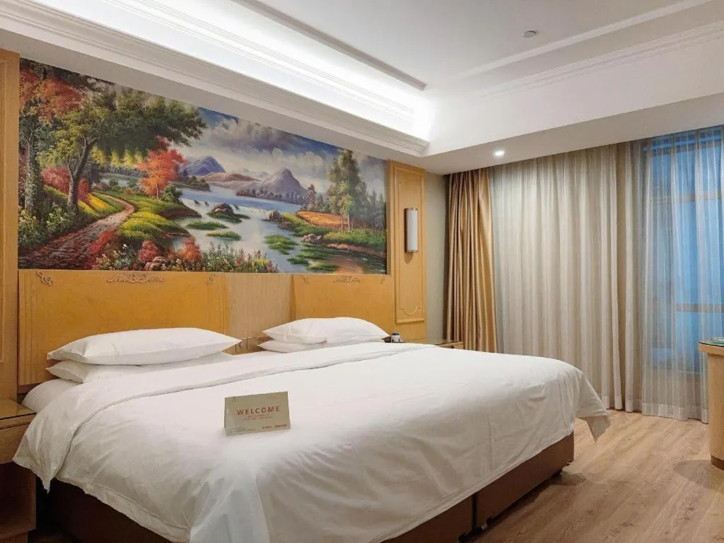 Bed in Vienna Hotel Chongqing Jiefangbei Hongyadong