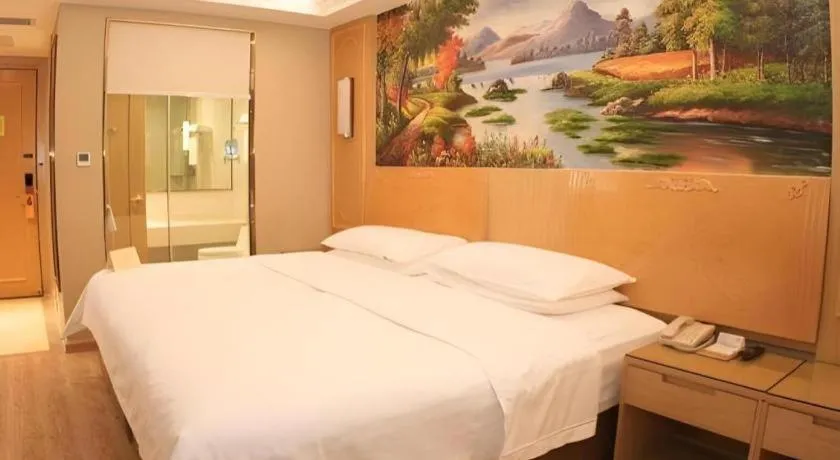 Bed in Vienna Hotel Chongqing Jiefangbei Hongyadong