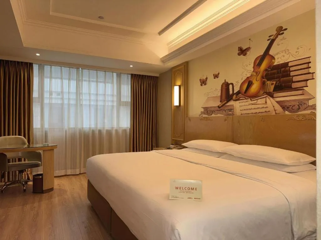 Bed in Vienna Hotel Chongqing Jiefangbei Hongyadong